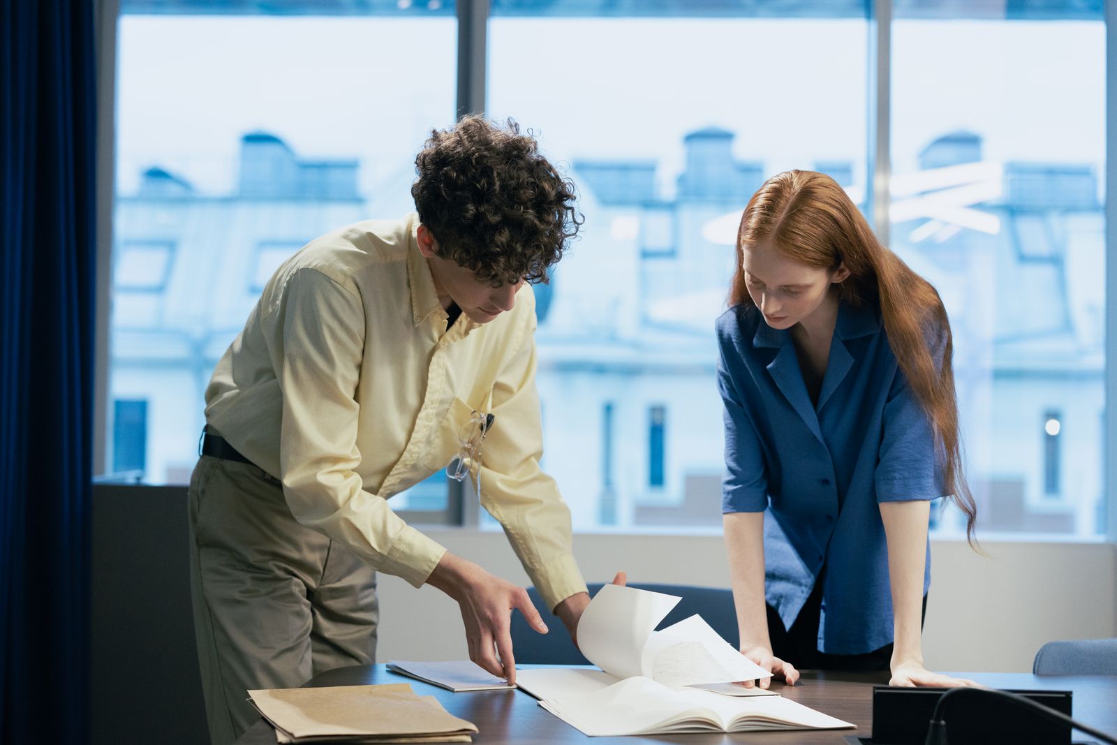 Two colleagues checking a patient record together